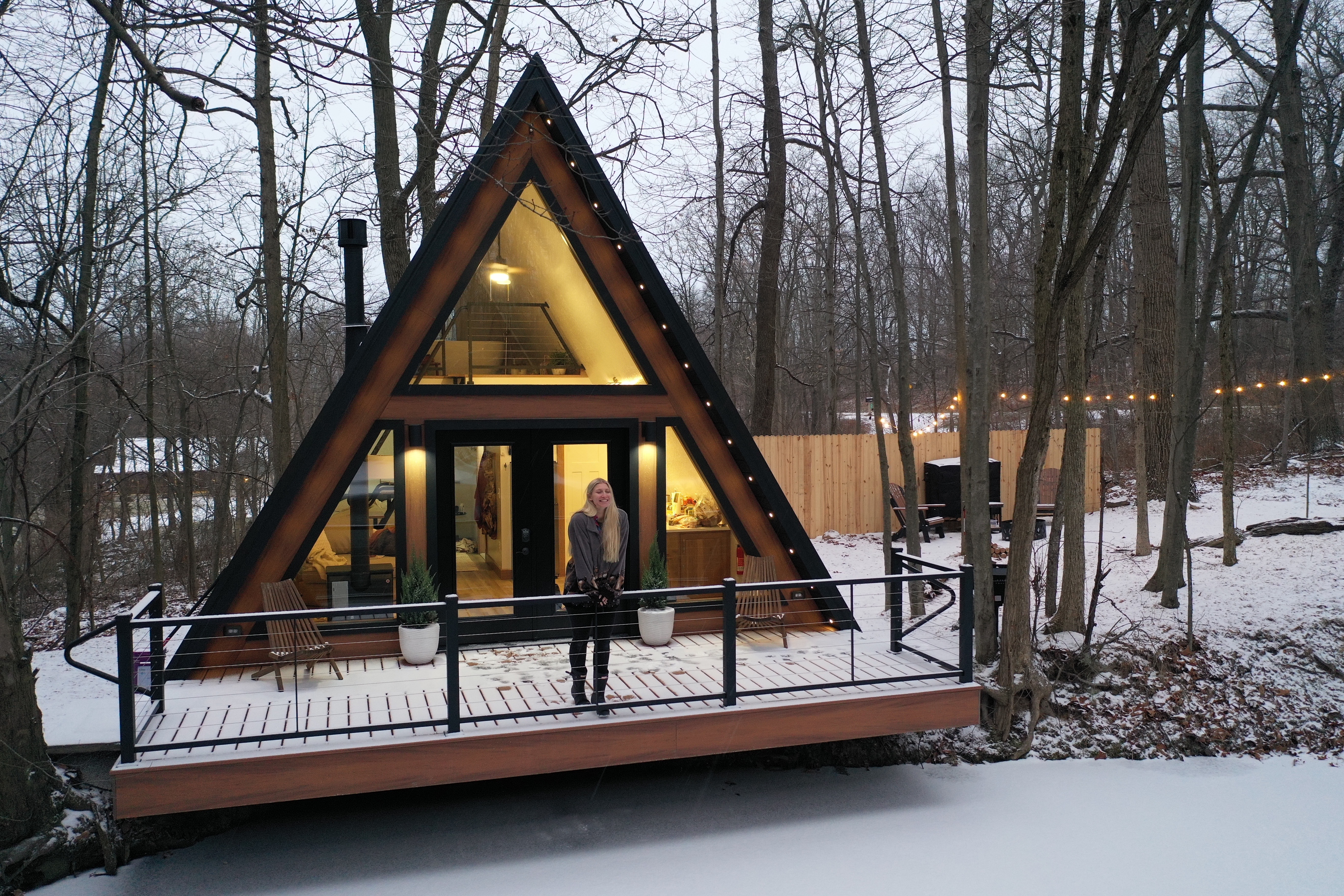 Snow-covered Forest Lane A-Frame photographed by drone